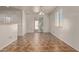 Dining area with tile floor and sliding glass door to backyard at 7420 W Glass Ln, Laveen, AZ 85339