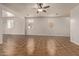 Bright living room with tile flooring and ceiling fan at 7420 W Glass Ln, Laveen, AZ 85339