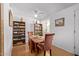 Cozy dining room with a ceiling fan, natural light, and decorative accents at 7810 N 47Th Ave, Glendale, AZ 85301