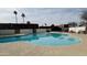 Relax at the refreshing community pool with lounge seating and shaded umbrellas at 7810 N 47Th Ave, Glendale, AZ 85301