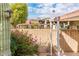 Landscaped backyard with a brick wall and mountain view at 7837 E Crestwood Way, Scottsdale, AZ 85250