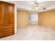 Spacious dining area with tile flooring and access to kitchen at 7837 E Crestwood Way, Scottsdale, AZ 85250