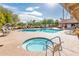 Community pool and spa with ample lounge chairs at 7837 E Crestwood Way, Scottsdale, AZ 85250