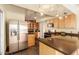 Modern kitchen with stainless steel appliances and wood cabinets at 8019 N 14Th St, Phoenix, AZ 85020