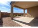 Covered patio with gravel landscaping, perfect for outdoor enjoyment at 8297 W Rushmore Way, Florence, AZ 85132