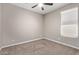 Spacious bedroom with ceiling fan and window blinds at 8297 W Rushmore Way, Florence, AZ 85132