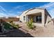 One story house with covered patio and landscaped backyard at 8297 W Rushmore Way, Florence, AZ 85132