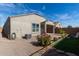 Rear view of house showcasing landscaping and AC unit at 8297 W Rushmore Way, Florence, AZ 85132