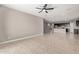 Open concept living room with view of kitchen at 8297 W Rushmore Way, Florence, AZ 85132