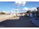 Large backyard with gravel and a small patio area at 8643 S 16Th Pl, Phoenix, AZ 85042