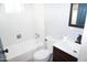 Clean bathroom with bathtub, toilet and vanity at 8643 S 16Th Pl, Phoenix, AZ 85042