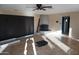 Living room with a fireplace and tile flooring at 8643 S 16Th Pl, Phoenix, AZ 85042