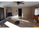 Spacious living room featuring a fireplace and tile floors at 8643 S 16Th Pl, Phoenix, AZ 85042