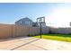 Artificial turf backyard with basketball court at 9625 E Spiral Ave, Mesa, AZ 85212