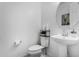 Clean and bright bathroom with pedestal sink and updated fixtures at 9625 E Spiral Ave, Mesa, AZ 85212