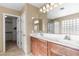 Double vanity bathroom with walk-in shower at 11625 W Jackson St, Avondale, AZ 85323