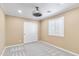 Neutral bedroom with ceiling fan, double door closet, and carpet at 11625 W Jackson St, Avondale, AZ 85323