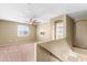 Spacious bedroom with ceiling fan, window shutters, and carpet at 11625 W Jackson St, Avondale, AZ 85323