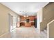 Kitchen with island, wood cabinets, and tile flooring at 11625 W Jackson St, Avondale, AZ 85323