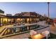 Expansive backyard with a large pool, fire pit, and mountain views at 13801 N Moon Dr, Phoenix, AZ 85023