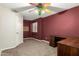 Bright bedroom with ceiling fan and built-in desk at 1451 E Ivanhoe St, Gilbert, AZ 85295