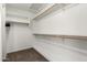 Large walk-in closet with double hanging rods at 1451 E Ivanhoe St, Gilbert, AZ 85295