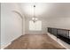 Elegant dining room with tile floors and chandelier at 1451 E Ivanhoe St, Gilbert, AZ 85295