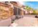 Brick paved porch with a black wrought iron bench at 1451 E Ivanhoe St, Gilbert, AZ 85295