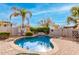 Enjoy this kidney-shaped pool with a waterfall feature at 1451 E Ivanhoe St, Gilbert, AZ 85295