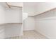 Spacious walk-in closet with ample shelving and hanging space at 15207 W Windward Ave, Goodyear, AZ 85395