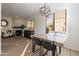 Bright dining area with wood table and modern lighting at 15380 N 100Th St # 1096, Scottsdale, AZ 85260