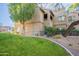 Two-story building with manicured lawn and landscaping at 15380 N 100Th St # 1096, Scottsdale, AZ 85260