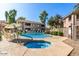 Community pool and spa with plenty of lounge chairs at 15380 N 100Th St # 1096, Scottsdale, AZ 85260