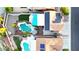 Aerial view of home showing pools, backyard pergolas, outdoor kitchens and solar panels at 15727 W Rimrock St, Surprise, AZ 85374