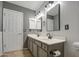 Bathroom with double vanity and updated fixtures at 15727 W Rimrock St, Surprise, AZ 85374