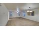 Open dining room with tile floor and chandelier at 15727 W Rimrock St, Surprise, AZ 85374