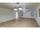 Bright dining room features tile flooring and chandelier at 15727 W Rimrock St, Surprise, AZ 85374