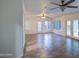 Spacious living room featuring tile floors and multiple windows at 15727 W Rimrock St, Surprise, AZ 85374