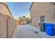 Side yard with basketball hoop and trash cans at 15727 W Rimrock St, Surprise, AZ 85374