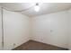 Small bedroom with carpeted floor and light fixture at 16230 N 35Th Way, Phoenix, AZ 85032