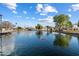 Serene community pond with trees and landscaping at 16230 N 35Th Way, Phoenix, AZ 85032