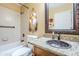 Bathroom with a copper sink and a walk-in shower at 17065 N Silver Path, Surprise, AZ 85374