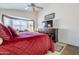 Relaxing bedroom with a king-size bed and built-in dresser at 17065 N Silver Path, Surprise, AZ 85374