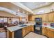 Spacious kitchen with an island and breakfast bar at 17065 N Silver Path, Surprise, AZ 85374