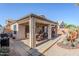 Covered patio with seating area, fire pit, and grill at 17065 N Silver Path, Surprise, AZ 85374