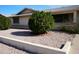 Landscaped front yard with gravel and shrubs at 17407 N Country Club N Dr, Sun City, AZ 85373