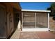 Screened-in patio, perfect for relaxing and enjoying the outdoors at 17407 N Country Club N Dr, Sun City, AZ 85373