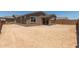 Spacious backyard featuring a covered patio, perfect for outdoor living and entertaining at 18219 W Hess St, Goodyear, AZ 85338
