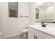 Bathroom with a single sink vanity and a mirror at 18219 W Hess St, Goodyear, AZ 85338
