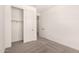 Cozy bedroom with carpet flooring and a closet for storage at 18219 W Hess St, Goodyear, AZ 85338